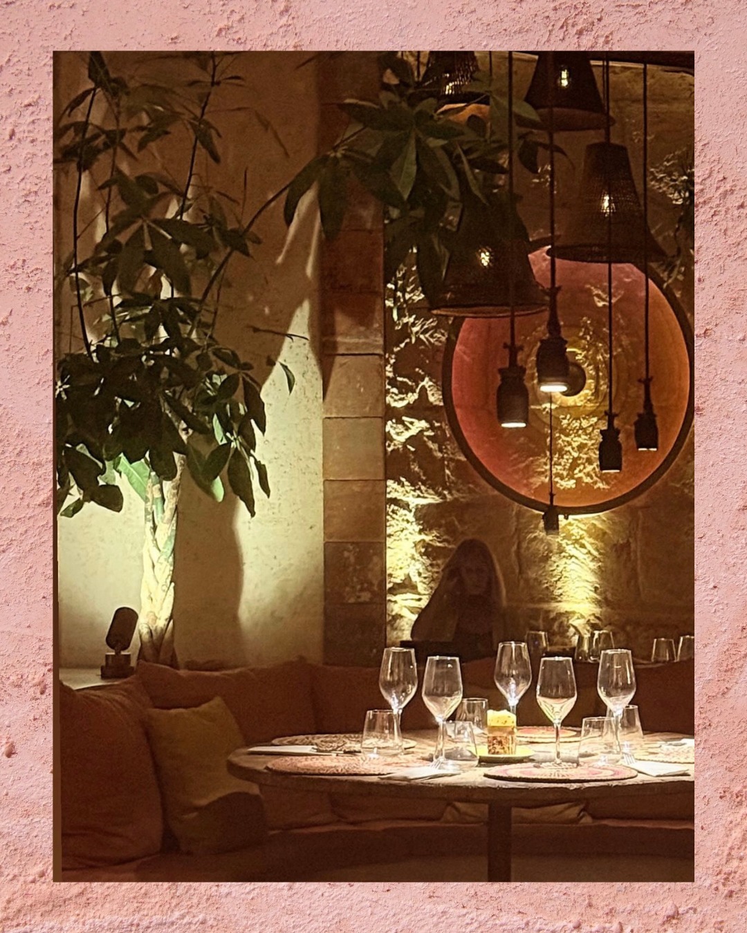 Stone water feature with olive leaf